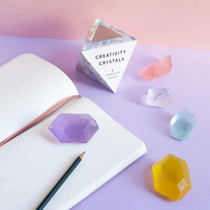 Creativity Crystals box with 5 crystal erasers and a notebook and pencil