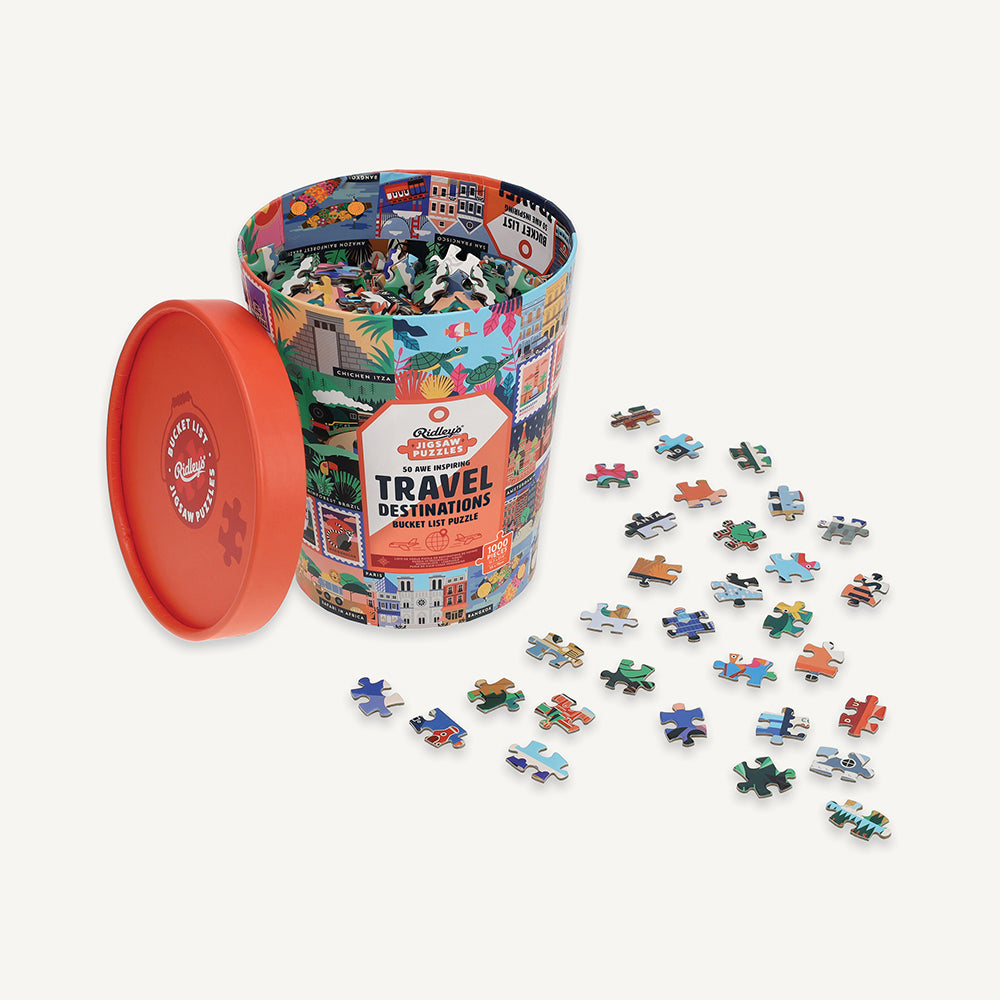 50 Awe-Inspiring Travel Destinations Bucket List 1000-Piece Puzzle bucket with lid off and unassembled jigsaw pieces