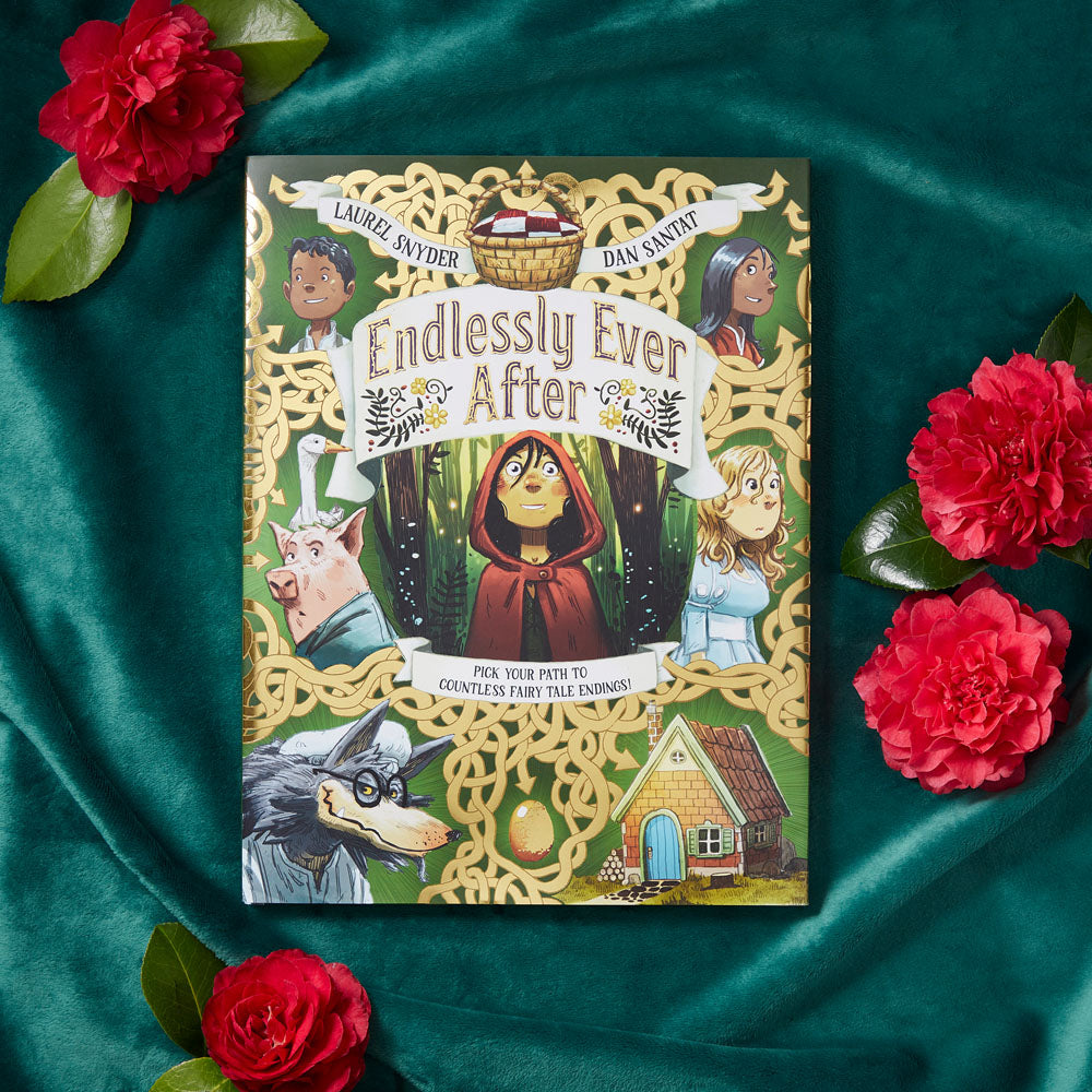 Endlessly Ever After on a green velvet backdrop with red flower
