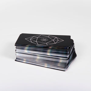 Mystic Mondays Tarot card stack showing iridescent card edges