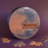 Mars: 100 Piece Puzzle with puzzle pieces and puzzle box
