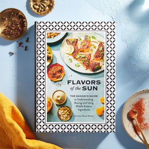 Flavors of the Sun with napkin and dishes of spices