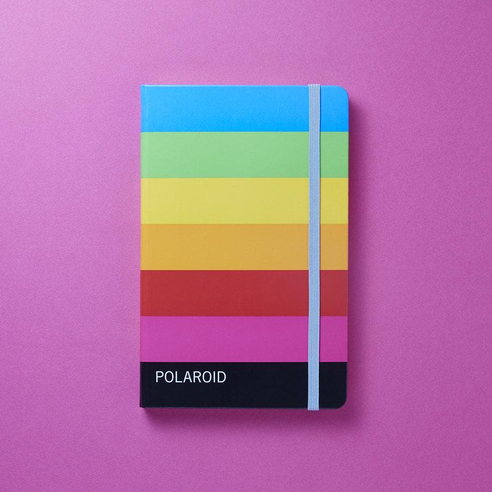 Polaroid Notebook on magenta background