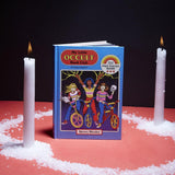 My Little Occult Book Club with lit candles and salt 